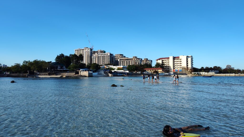 View of a hotel from the ocean.